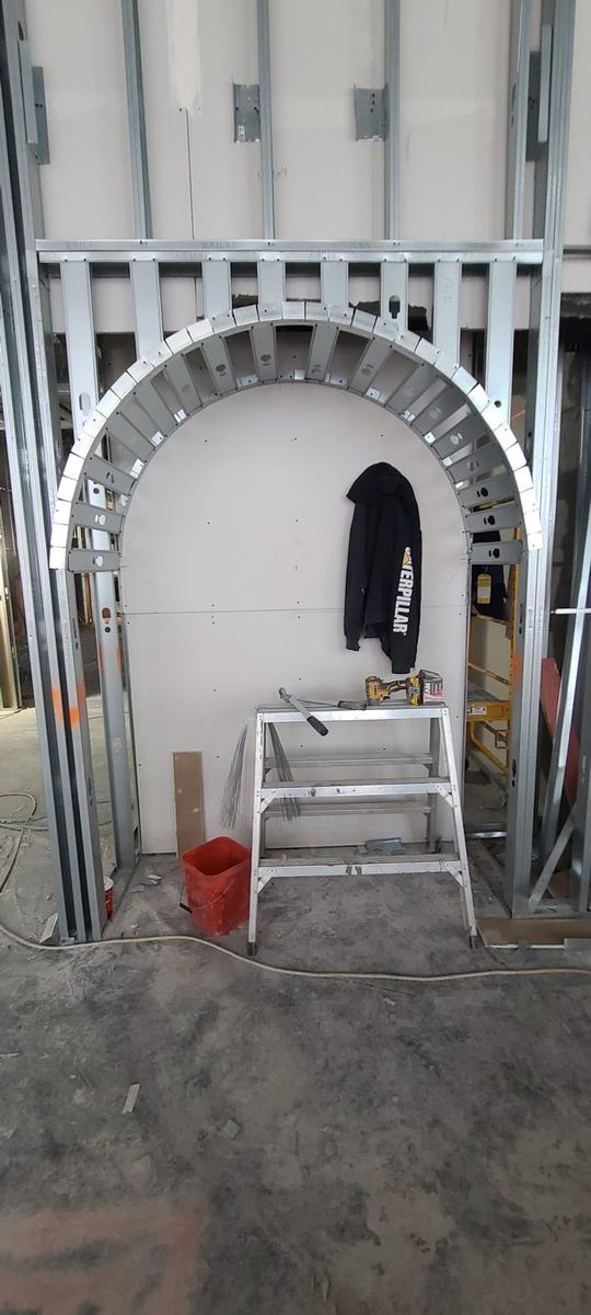 Arched opening framed in steel stud with radius track